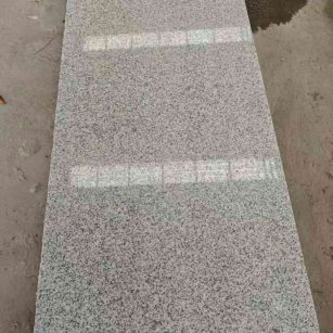 济南芝麻白光面毛板